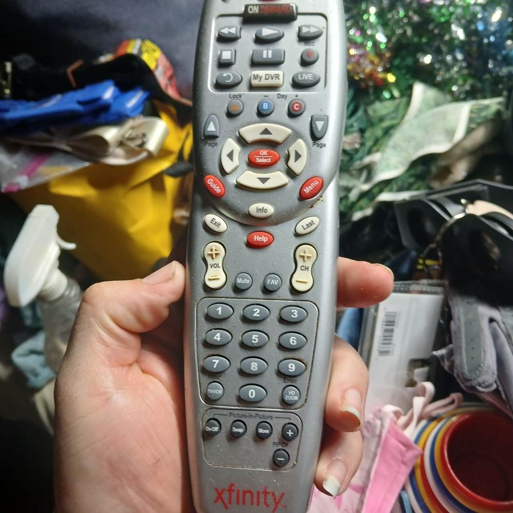 Comcast Xfinity Universal Remote Control, likely model URC1167 No Battery Cover